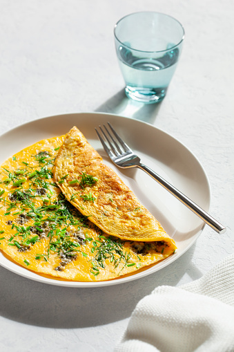 omelette with blue cheese herbs spring onion. healthy keto diet low carb breakfast