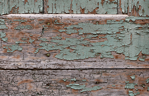 Old blue color painted weathered wooden plank