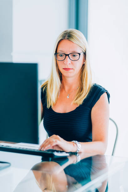 istock Business woman working on laptop 1497180801