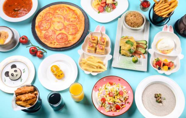 istock Top view of dishes from the Children's menu on a blue surface 1497183119