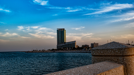 A building at the seafront on the corniche of Al Khobar photographed at sunset