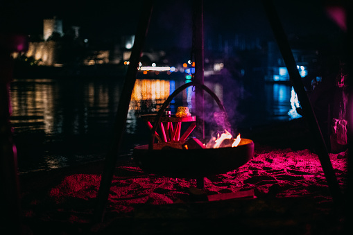 Outdoor Fireplace Burning at Night Beach Party