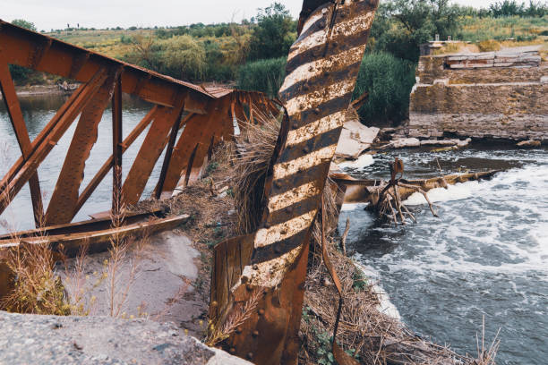 istock Bridge on the river, destroyed by the water flow 1497190719