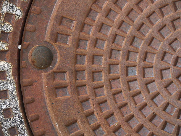 istock Rusty, metal lid of a manhole. 149719482