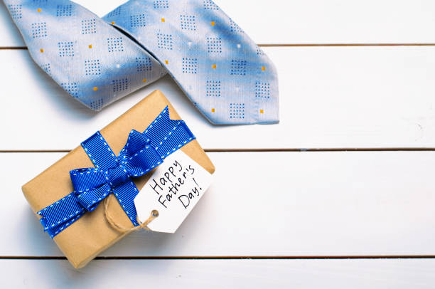 istock Father's Day Background, Gift Box over White Background 1497199101