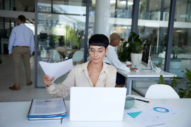 istock Boss comes in with more work to unhappy employee 1497203030