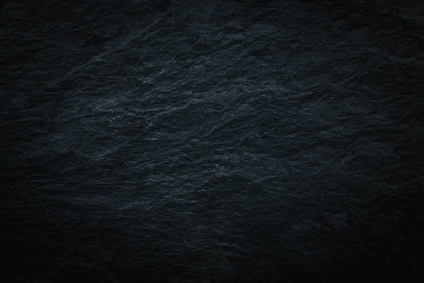 istock Dark grey black slate background texture, Rock texture, The surface of the mountain is like a stone wall, gray grunge background with copy space for design 1497206120