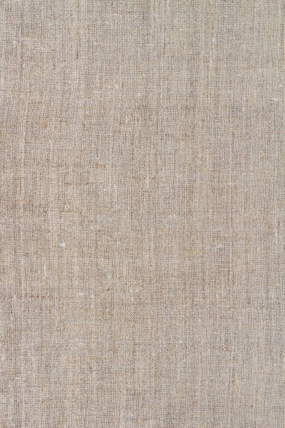 istock Natural linen fabric, background or texture, natural gray beige color 1497209945