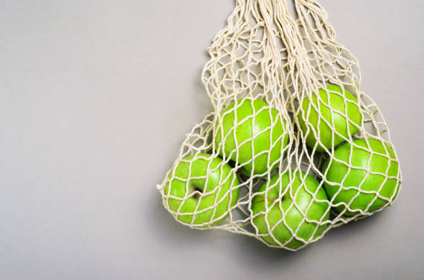 istock Apples in Mesh Bag, Reusable Eco Friendly Cotton Bag 1497210156