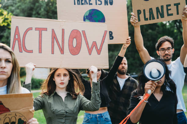 istock A group of climate activists are marching together in a demonstration against climate change 1497210910