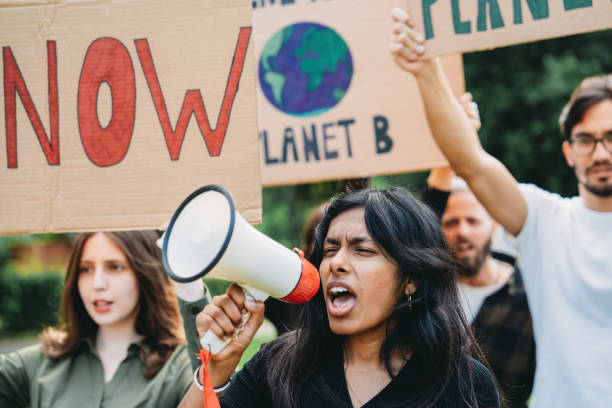 istock A group of climate activists are marching together in a demonstration against climate change 1497210911