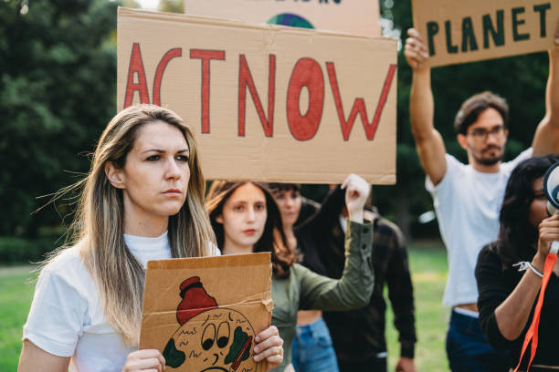 istock A group of climate activists are marching together in a demonstration against climate change 1497210921