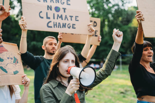 istock A group of climate activists are marching together in a demonstration against climate change 1497210947