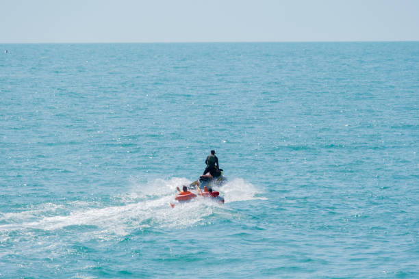 istock Entertainment at sea, riding on an inflatable boat 1497213183