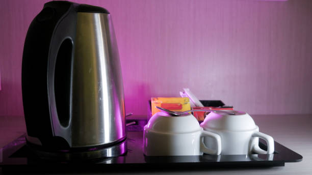 istock Room Hotel Complimentary Front View With Purple Lighting in Background 1497217394
