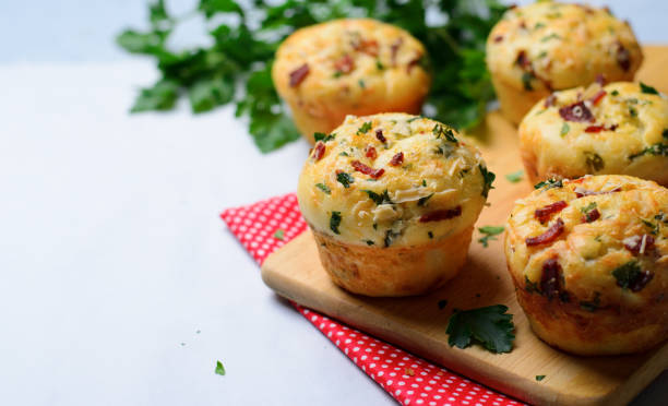 istock Savory Muffins with Cheese and Bacon, Freshly Baked Tasty Snack 1497220677