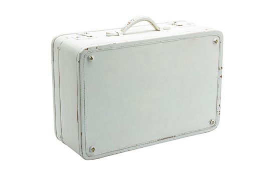 Retro suitcase with the lid closed isolated on white background.