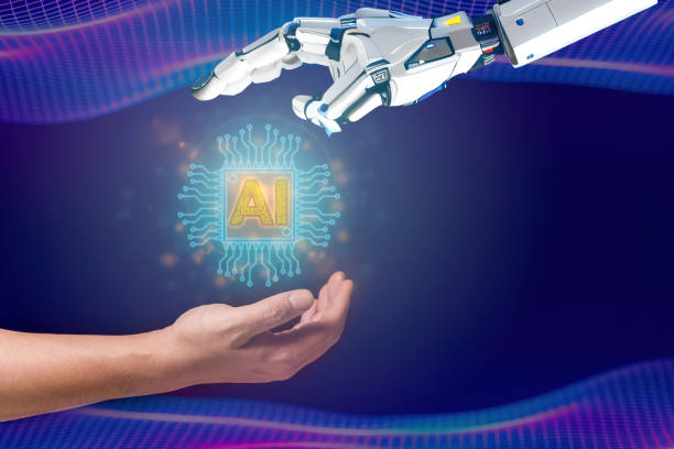 istock artificial intelligence technology concept, a robot hand and a human hand with glowing ai chipset symbol hologram. 1497225109