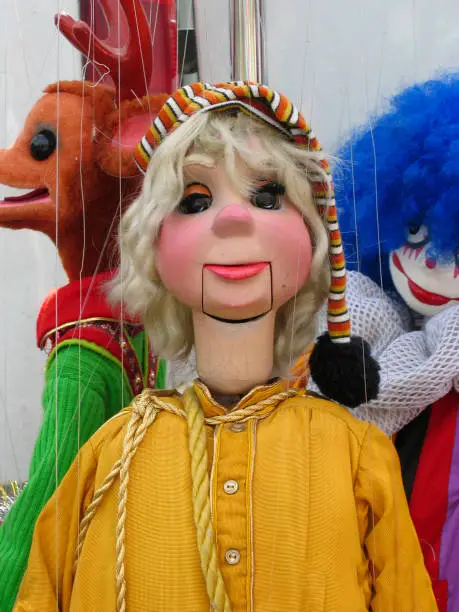 Traditional puppets made of wood in a city theater