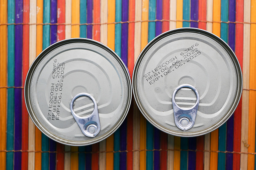 expire date on food can on white background