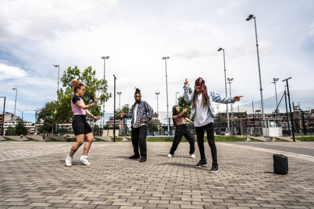istock Friends breakdancing together outdoors 1497235017