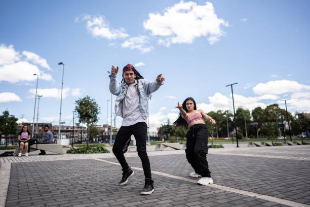 istock Young friends breakdancing outdoors 1497235332
