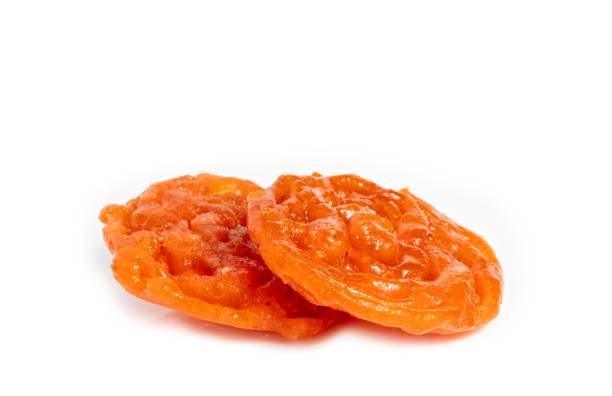 istock Jalebi or Jilapi Isolated on White Background with Copy Space, Also Known as Zalabia or Mushabak 1497240025