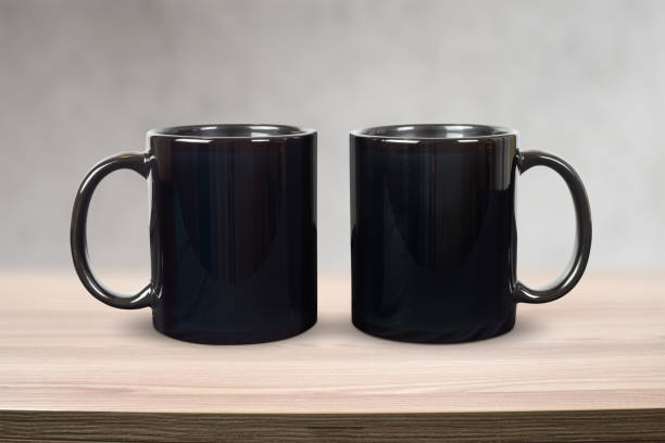 istock Black 11 oz. Mugs Mockup in Modern Scandinavian Room 1497241244