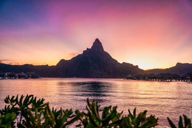 istock Sunset over Sea and Mountain in Bora Bora 1497247519