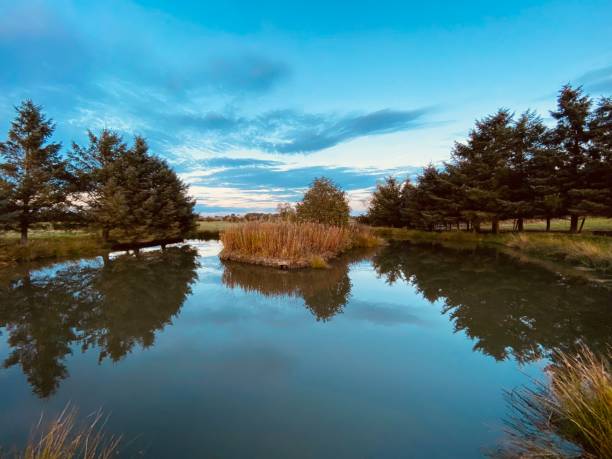 istock Sunset over a lake in County Durham 1497248041