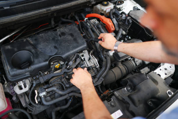 istock male mechanics hands check electrical wiring vehicle system in a car service 1497251794