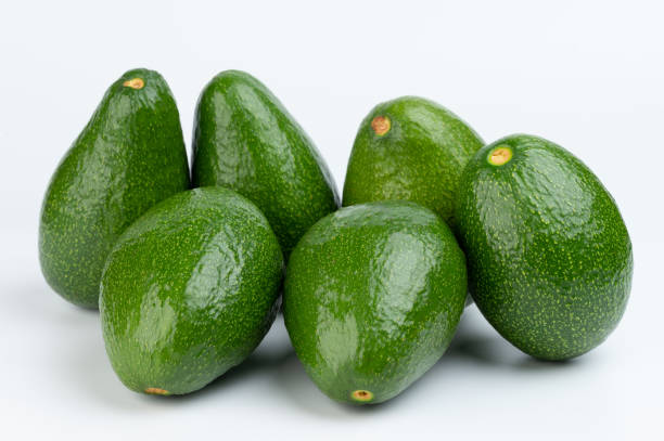istock Shiny green avocado pile 1497252654