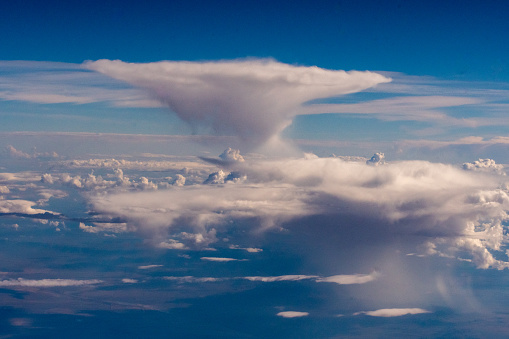 9/22/2022 - Over the USA Aerial view of clouds out an airplane window on a flight from Chicago to Los Angeles.