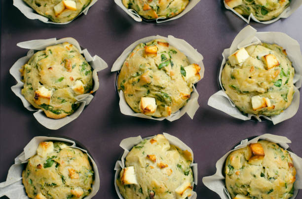 istock Spinach and Feta Cheese Muffins in Baking Tin 1497259327