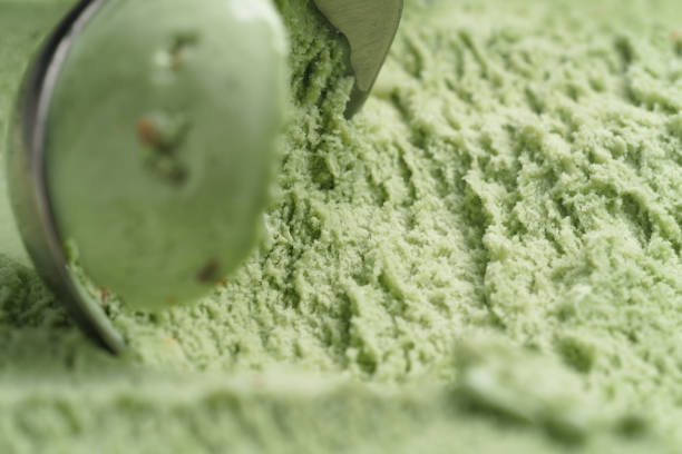 istock scooping natural pistachio ice cream closeup 1497261883