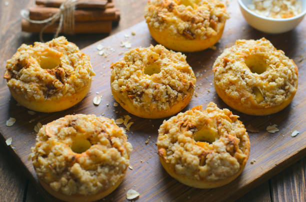 istock Apple Pie Donuts with Cinnamon Oatmeal Crumble, Homemade Doughnuts 1497262920