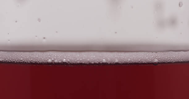 istock macro shot pour cherry beer in glass 1497265894