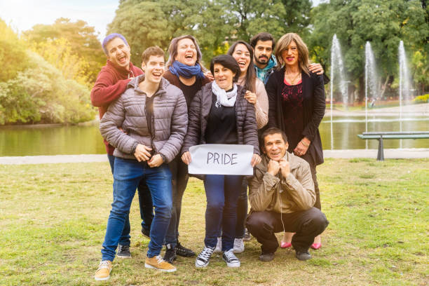 istock Pride. Cheerful queer group holding a message supporting the LGBT community 1497267160