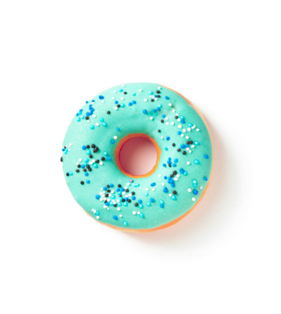 istock Sweet donut in colored blue glaze on a white background top view 1497269129