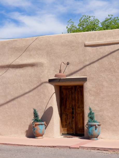 istock Traditional adobe doorway with blue sky above 1497269131