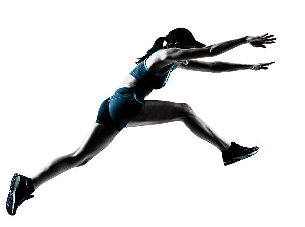 corredor de mujer salto impulsor - evento de prueba de campo feminino fotografías e imágenes de stock