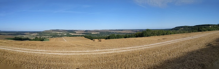 Looking across fields of freshly harvested crops near Amberly, West Sussex