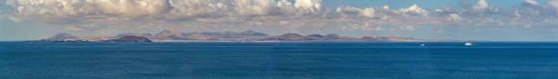 views of south east lanzarote coast - lanzarote bay canary islands beach imagens e fotografias de stock