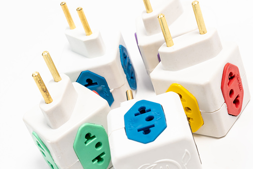colorful Multi plug power adapter isolated on white.