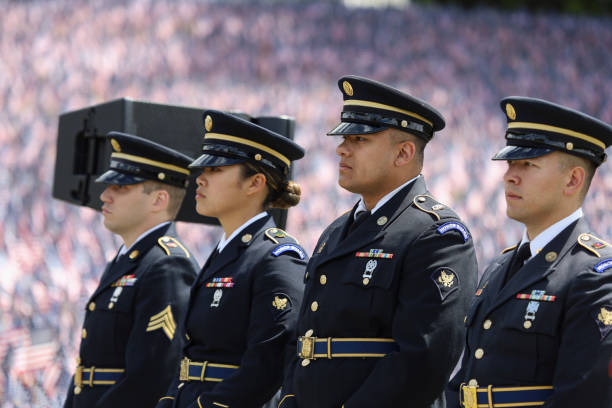Honor Guards at Boston Memorial Day Ceremony Honor Guards at Memorial Day ceremony, background are 37.000 U.S. flags and Soldiers and Sailors Monument in Boston Common,U.S. May 25, 2023. proud army mom stock pictures, royalty-free photos & images