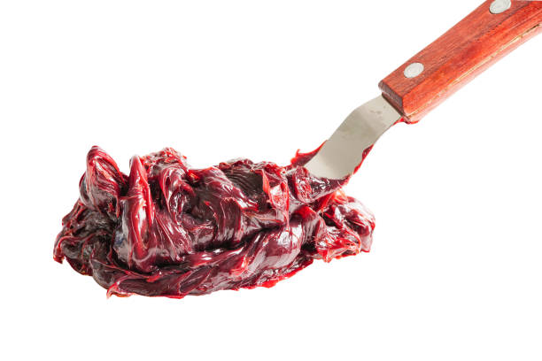 istock Grease isolated on white background with clipping path, red excellent water resistance synthetic lithium complex. 1497288310