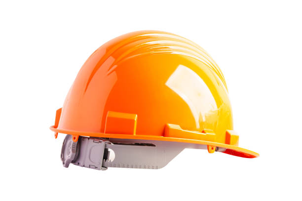 istock Orange helmet isolated on white background with clipping path, protect to safety for engineer in construction site. 1497288680