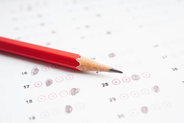 istock Answer sheets with pencil drawing fill to select choice, education concept. 1497288714