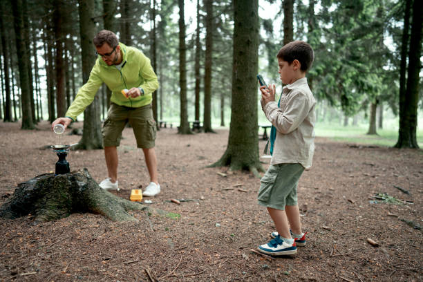 istock Son taking picture of his father 1497289414