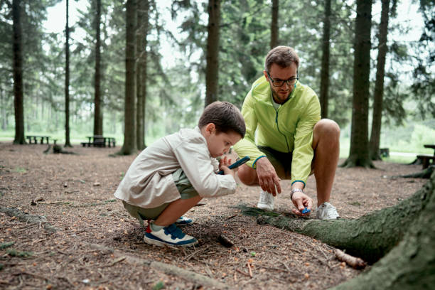 istock Little boy spending time with his father 1497289562